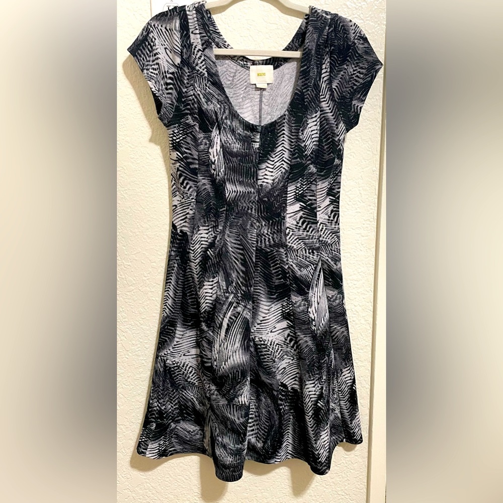 This is an Medium sized Black-gray dress of MaEve Brand